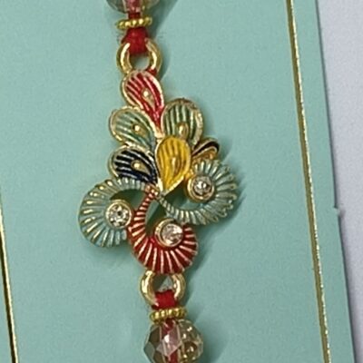 Fancy Rakhi Designs Pendant Gold Beads Mauli Raksha Bandhan